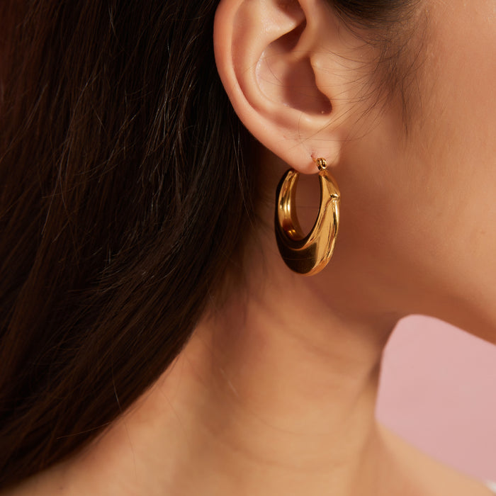 Wholesale Peach heart stainless steel hollow earrings with fashionable temperament, geometric smooth surface earrings, color preservation electroplating