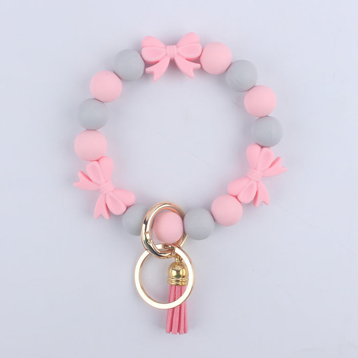 Wholesale Cartoon bow silicone bracelet keychain handmade beaded bracelet jewelry