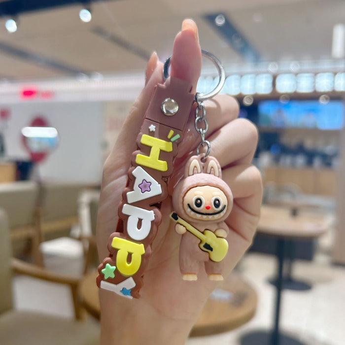Wholesale Cute cartoon silicone keychain with cute little monster keychain for sweatshirt