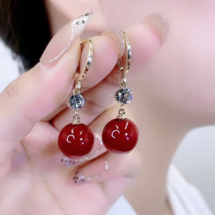 Wholesale Acacia earrings red pearl earrings with sweet temperament