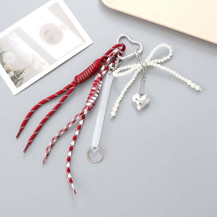 Wholesale Leather bow heart pendant luggage keychain lanyard accessories single buckle tassel pendant accessories