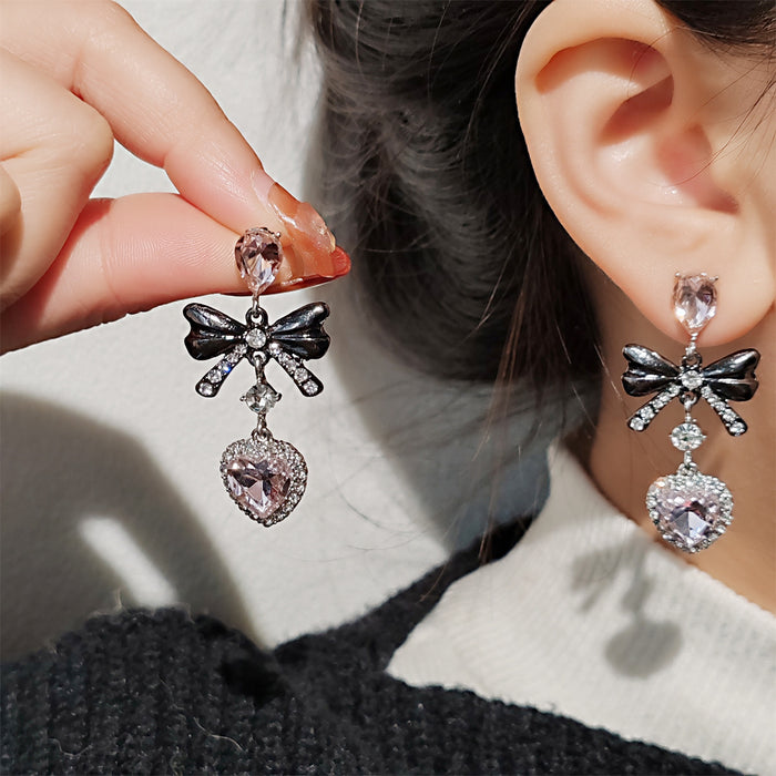 Wholesale Small niche zircon inlaid heart-shaped bow earrings with elegant temperament