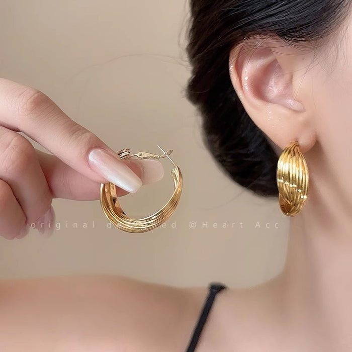 Wholesale Earrings, silver needles, niche design, high-end twisted ear loops