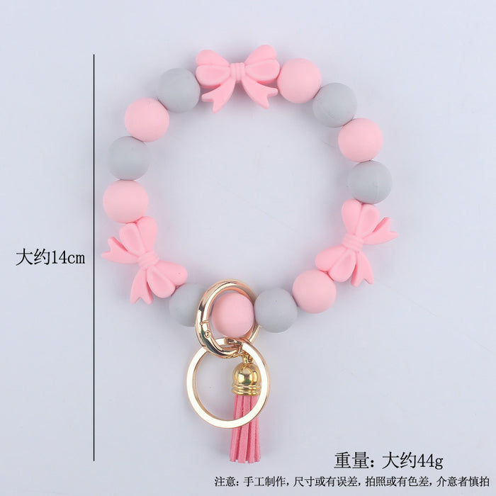Wholesale Cartoon bow silicone bracelet keychain handmade beaded bracelet jewelry