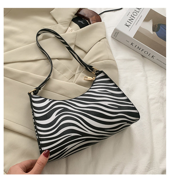 Wholesale Niche Design Bag Popular Hand-held Women's Bags Fashionable Leopard Print Single Shoulder Armpit Bags JDC-SD-MO005