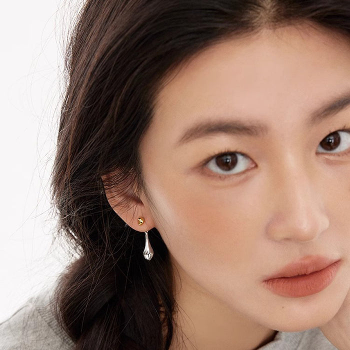 Wholesale Retro contrasting water droplet earrings with niche design, high-end sense, simple personality, fashionable temperament, silver plated earrings