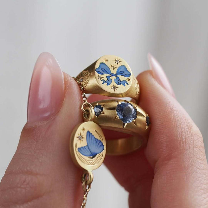 Wholesale Stainless steel pendant necklaces with various painted patterns.