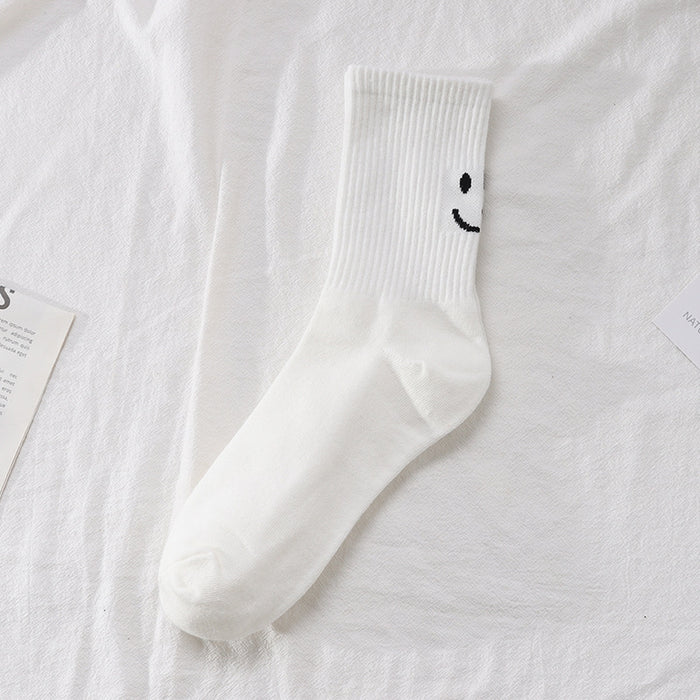 Wholesale Smiling face socks Solid color women's socks Middle tube socks Women's calf socks Cotton socks
