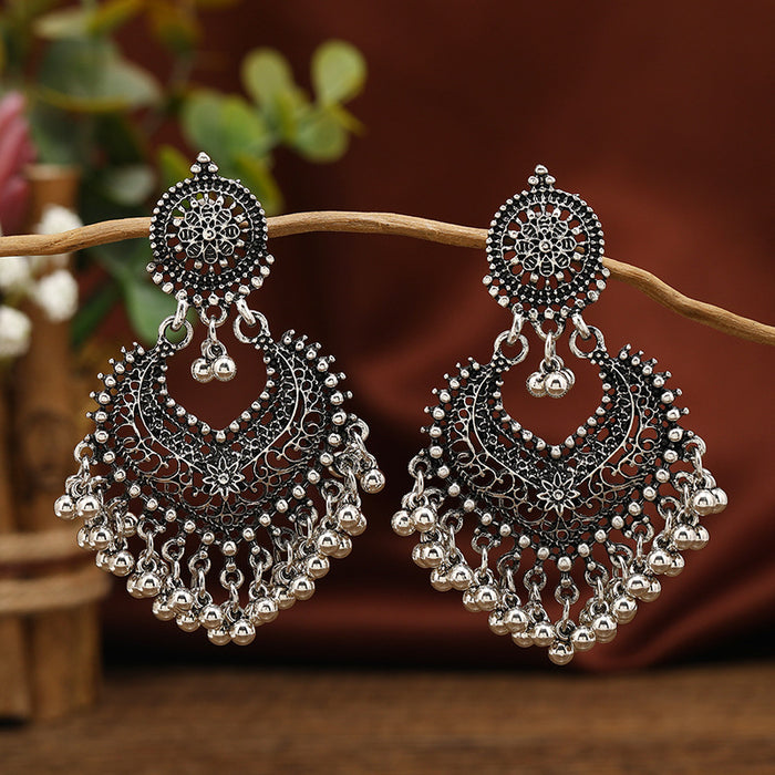 Wholesale Retro Bohemian ethnic style earrings for women exaggerated temperament hollow heart earrings long bell India