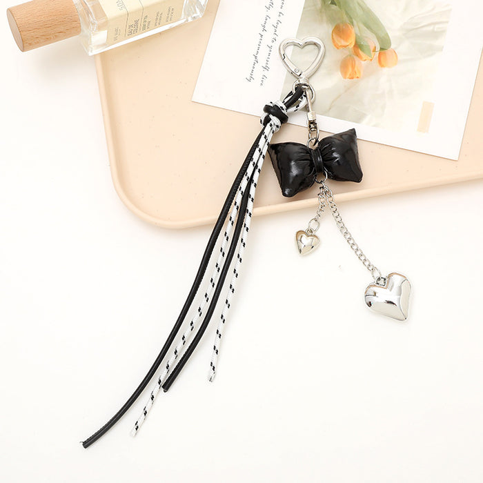 Wholesale Leather bow heart pendant luggage keychain lanyard accessories single buckle tassel pendant accessories