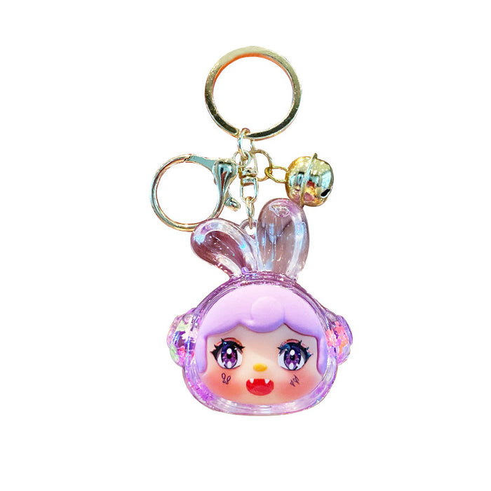 Wholesale Oil-flow sand earphone rabbit keychain