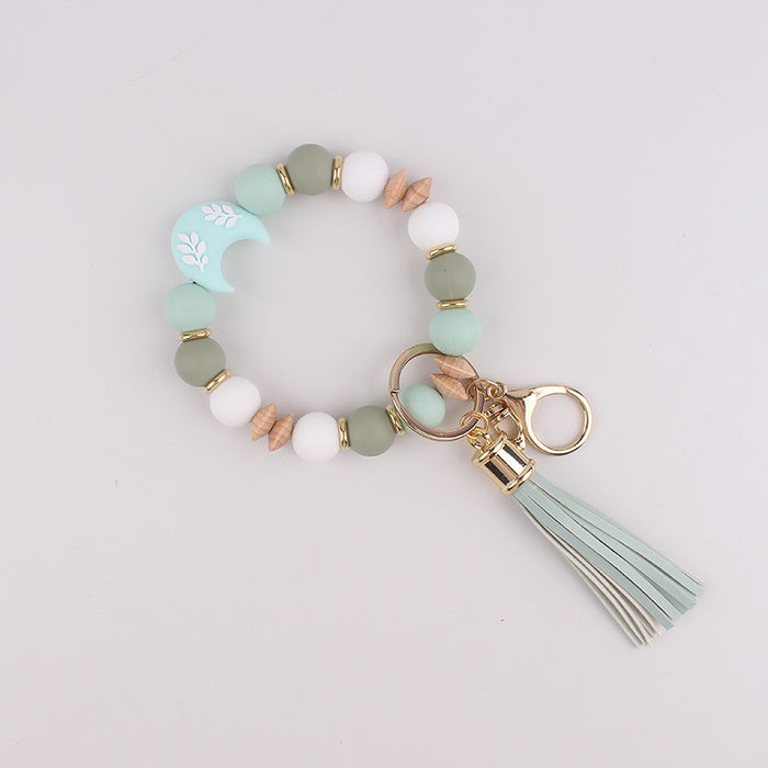 Wholesale Silicone moon beads bag key bracelet bracelet silicone beads beech wood beads tassel keychain