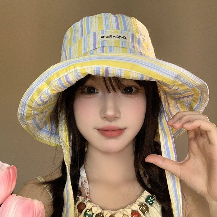 Wholesale Versatile striped strap fisherman hat new cute sun hat thin casual large brim sun hat