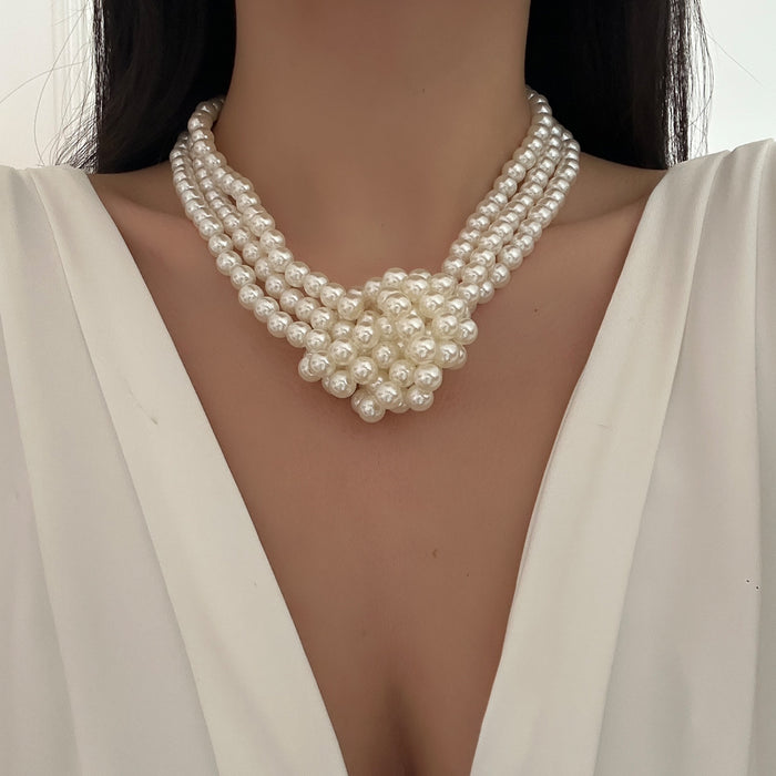 Wholesale Fashionable trend multi-layer imitation pearl necklace, artistic retro black and white color matching, high-end feeling pearl collar