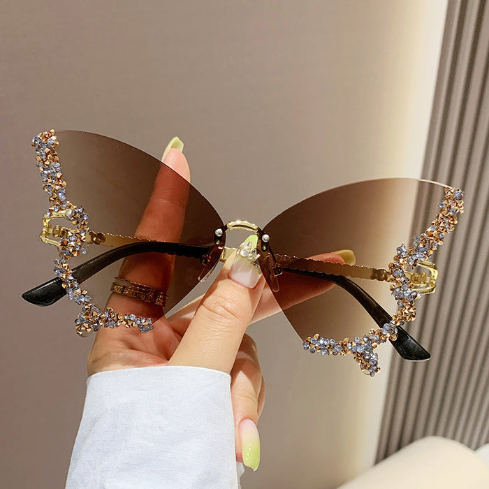 Wholesale New butterfly studded diamond rimless sunglasses with fashionable and exaggerated personality