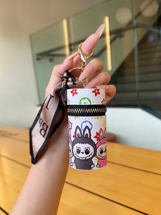 Wholesale Lipstick storage coin purse portable mini small cylinder cosmetic bag with pendant key