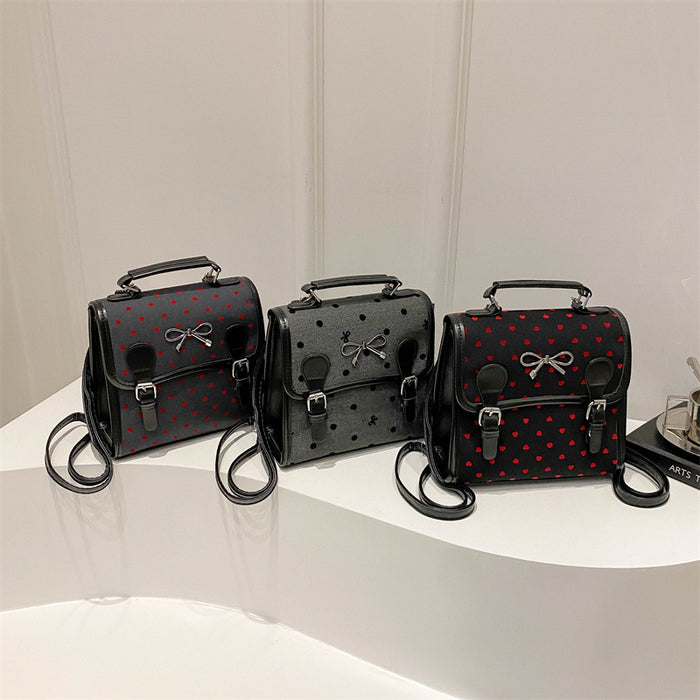 Wholesale Casual and fashionable handbag with heart-shaped printed canvas shoulders