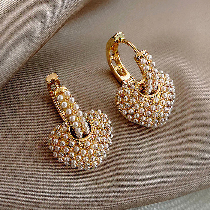 Wholesale Fashionable and exquisite pearl heart ear buckle with a high-end feel, a two wearing temperament geometric earring