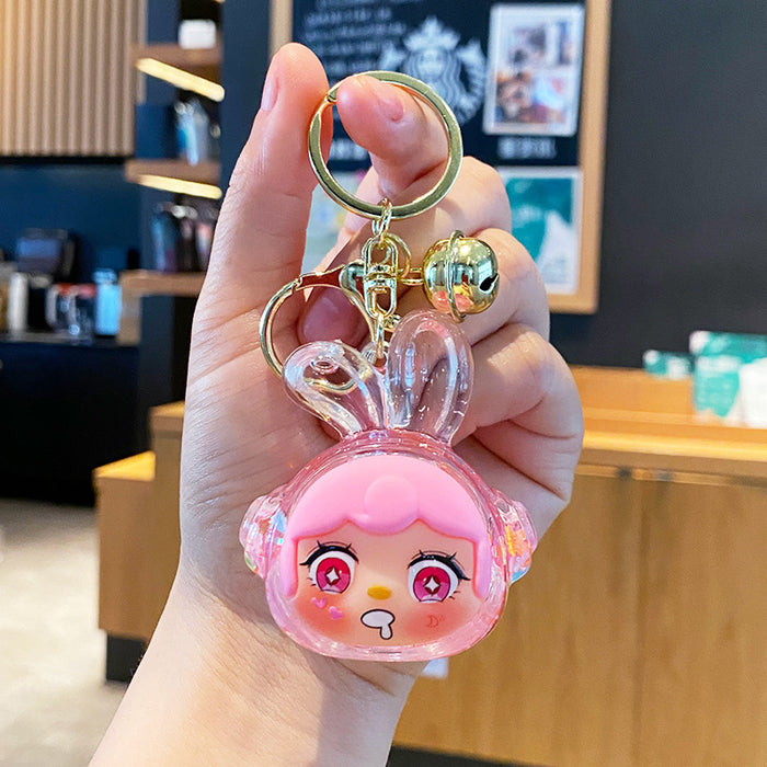 Wholesale Oil-flow sand earphone rabbit keychain