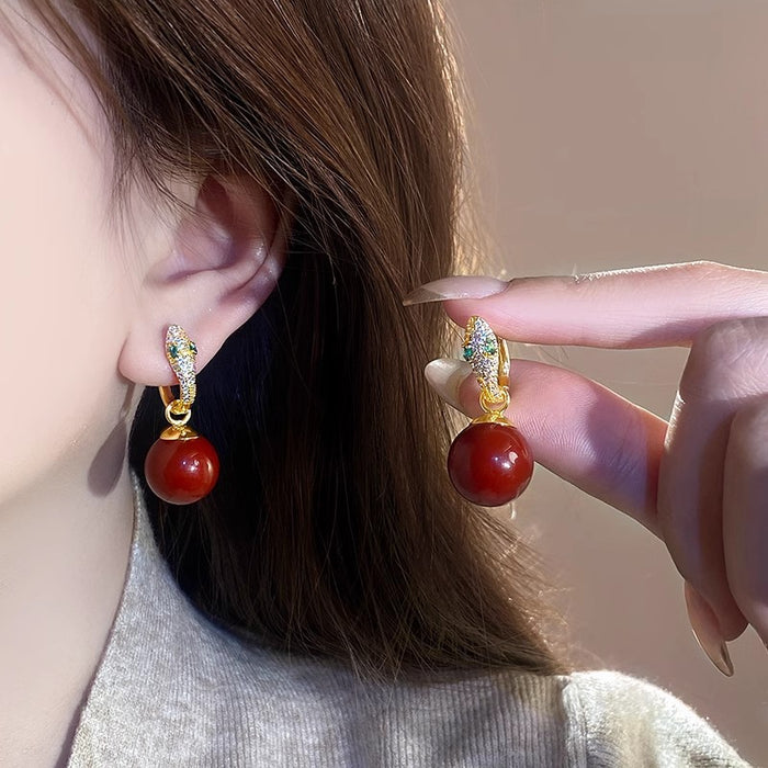 Wholesale Full diamond earrings with a niche design, snake shaped pearl earrings, unique earrings, and ear buckles