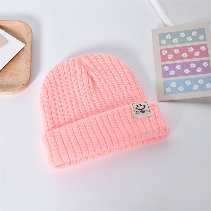 Wholesale Casual, fashionable, warm knit hat, cute smiling face pullover hat