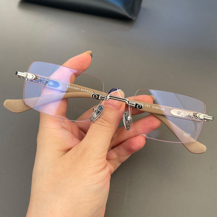 Wholesale Retro perforated frameless glasses with personalized frames for men and women, ultra light and fashionable