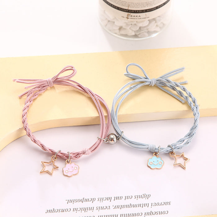 Wholesale Cartoon couple bracelets a pair of small rubber band magnets attract bell bracelet gift