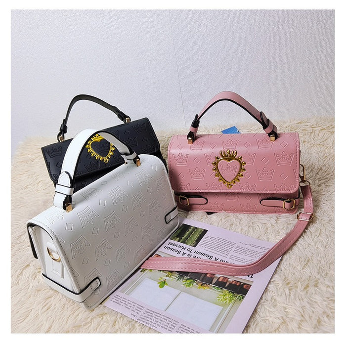 Wholesale Heart-shaped crown print shoulder bag for commuting