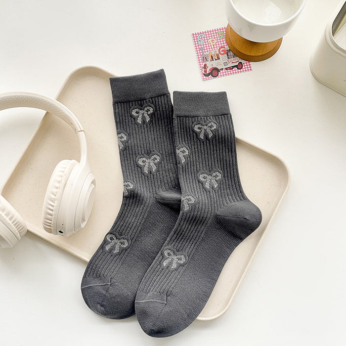 Wholesale Butterfly knot socks, children's mid tube socks, pile socks, boneless long tube socks, fashionable women's socks