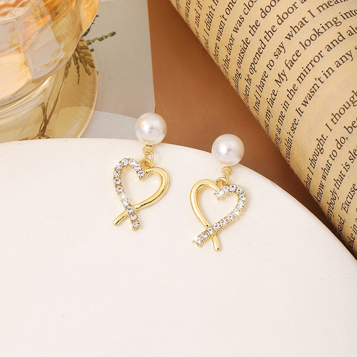 Wholesale New Fashionable Pearl Love High End Design with a Small Niche, Earrings and Accessories, Butterfly Knot Earrings, Light Luxury