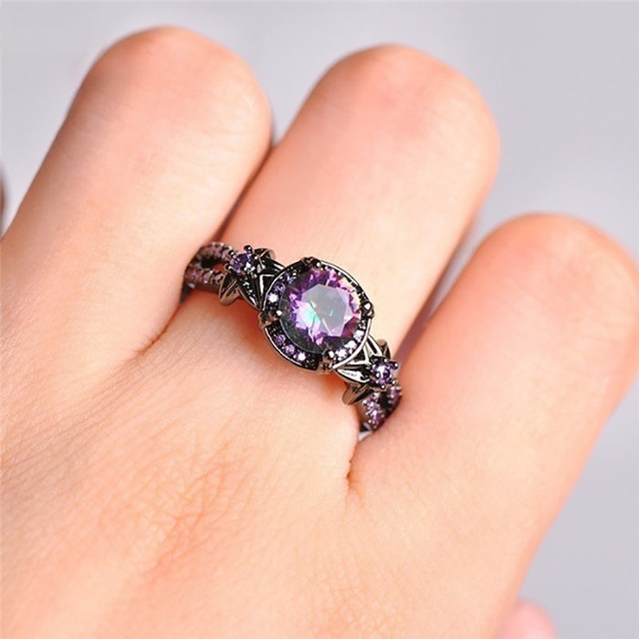 Wholesale Rings Black gold skull purple zircon ring  JDC-RS-HuaJ001