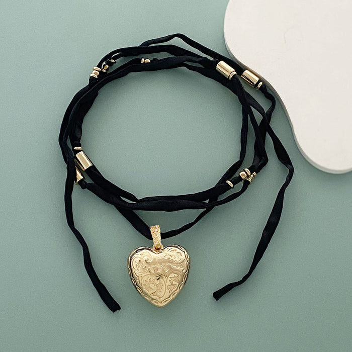 Wholesale three-dimensional relief love pendant long fabric trend necklace fashion