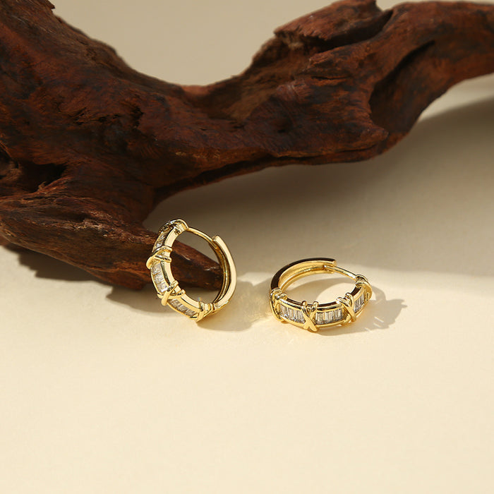 Wholesale High end light luxury zircon earrings with diamond inlay, niche ear buckle design, temperament and earrings