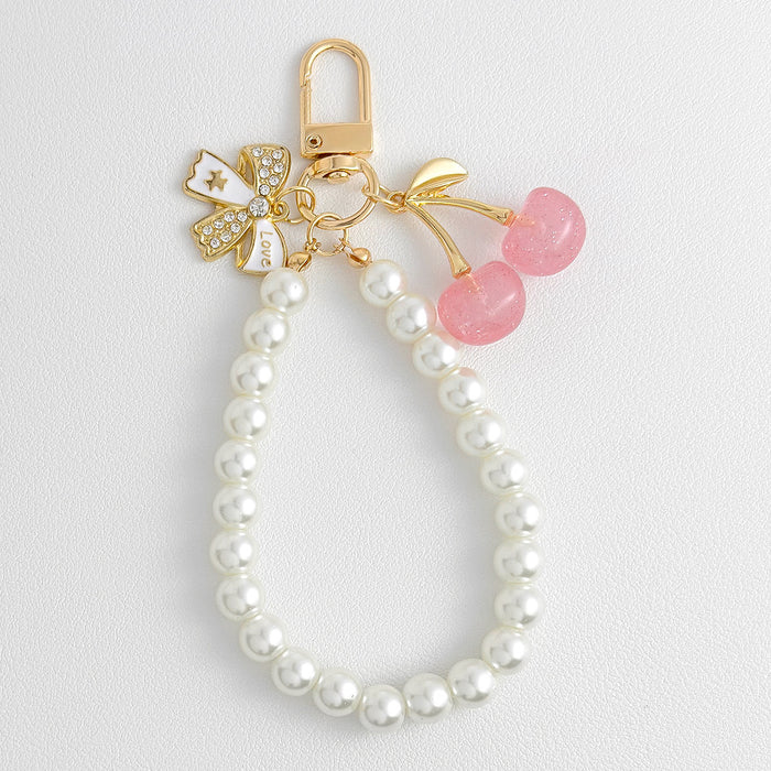 Wholesale Pearl chain beaded mobile phone lanyard bow pendant keychain