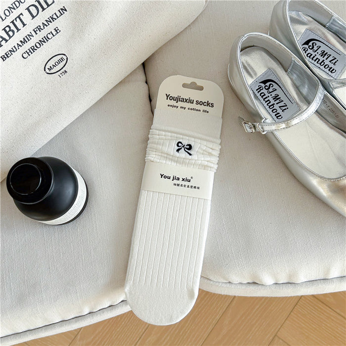 Wholesale Butterfly knot embroidered socks, solid color boneless pile socks, white socks