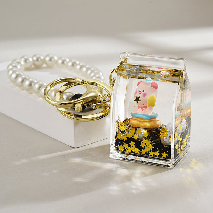 Wholesale Oil-Filled Black Gold Quicksand Piggy Liquid Keychain