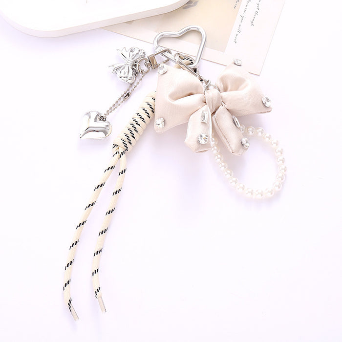 Wholesale Leather bow heart pendant luggage keychain lanyard accessories single buckle tassel pendant accessories