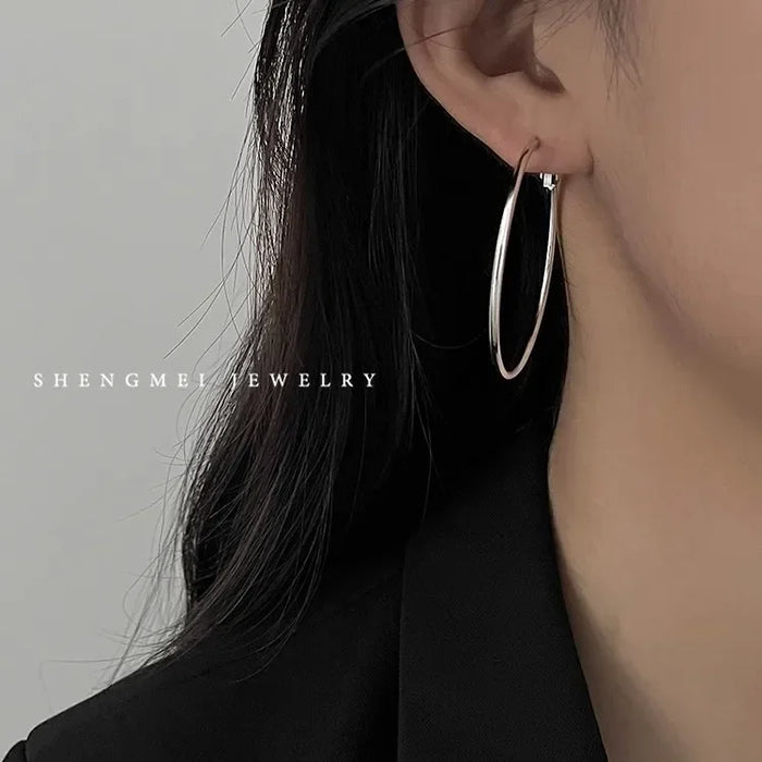 Wholesale Pure silver earrings with large circles, plain circles, and high-end feel. Round circle earrings