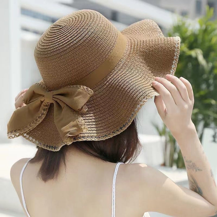 Wholesale Bow hat, large brimmed straw hat, sun hat, fashionable sun hat