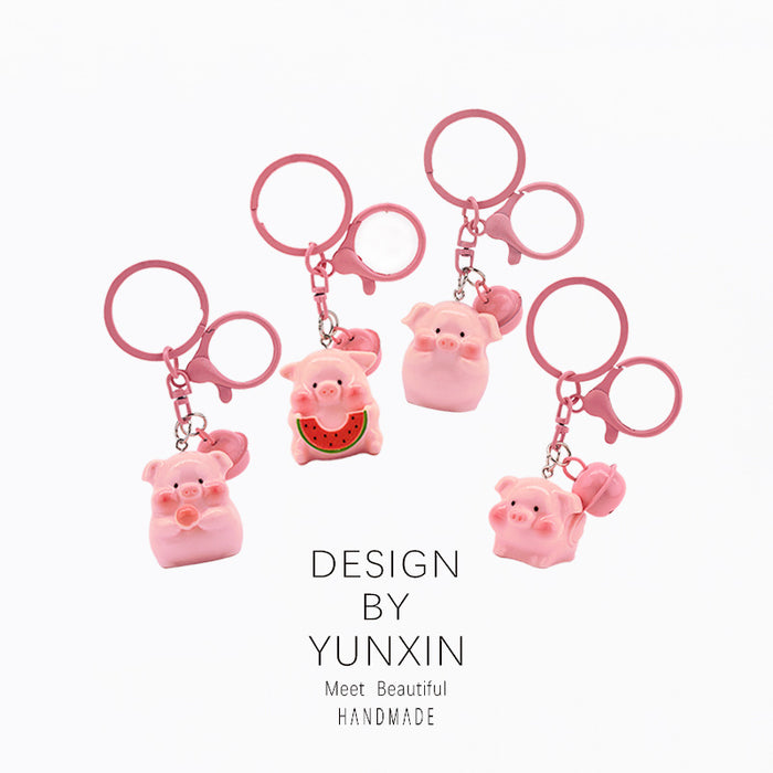 Wholesale Cute three-dimensional super cute bell pig keychain pendant backpack decoration pendant couple