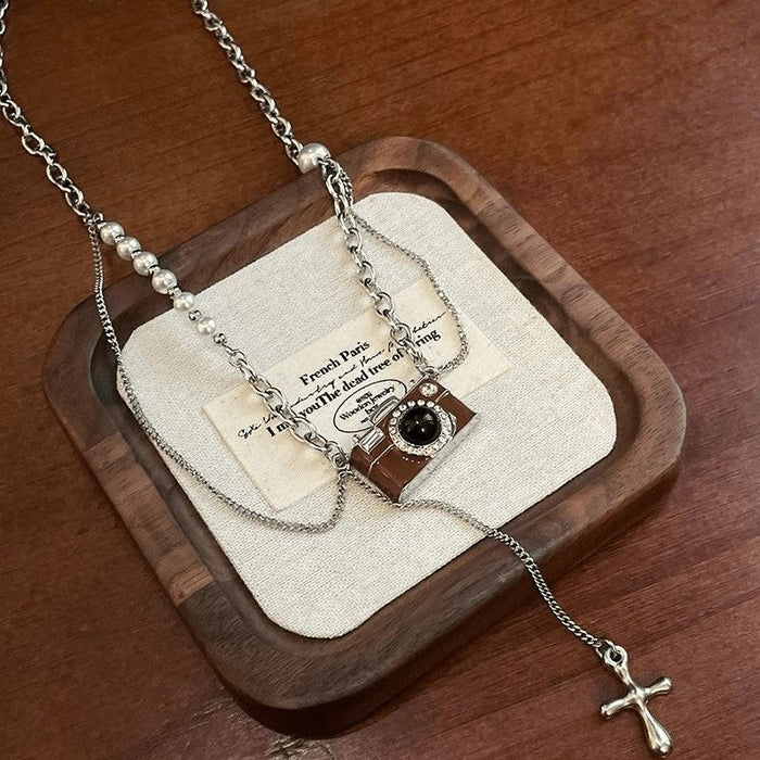Wholesale Retro brown camera necklace with high-end design, zircon pendant, sweater chain, sweatshirt chain