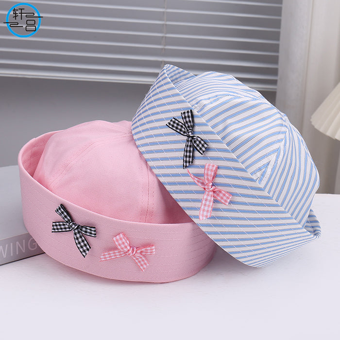 Wholesale Striped bow sailor hat is lightweight, breathable, niche, and comfortable with flip over eaves