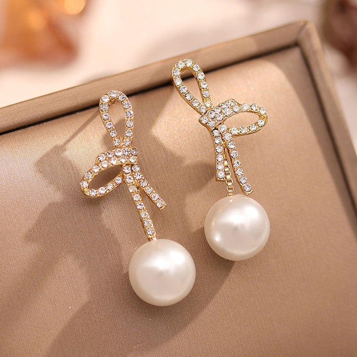 Wholesale Pearl earrings new niche design temperament earrings simple and versatile bow earrings
