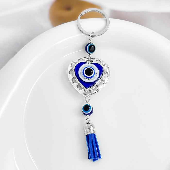 Wholesale Diamond-encrusted blue eyes evil eye tassel keychain