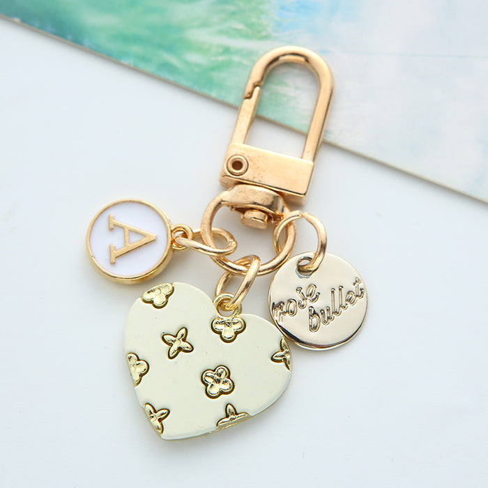 Wholesale alloy love keychain pendant hollow small flower letter round card accessories