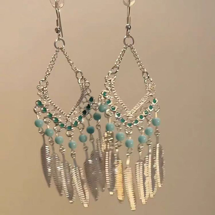 Wholesale Feather long tassel earrings with retro and niche design, fashionable and exquisite ear hooks