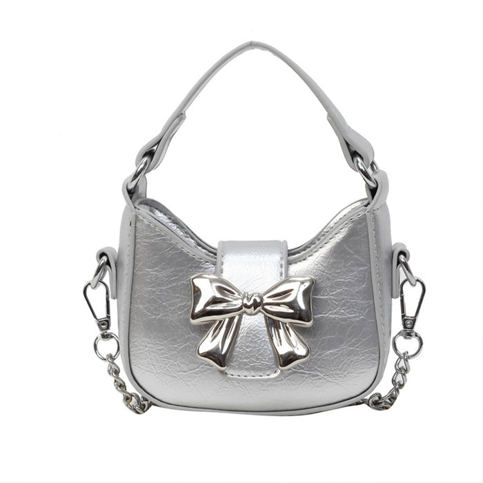 Wholesale New retro oil leather handbag with shiny bow and chain crossbody bag