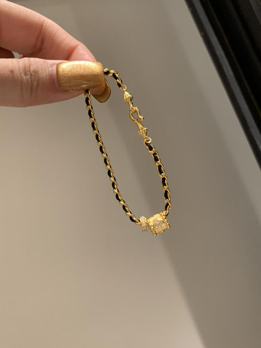 Wholesale Light luxury black gold woven bracelet, women's personality, versatile bracelet, unique and niche design, handmade accessory