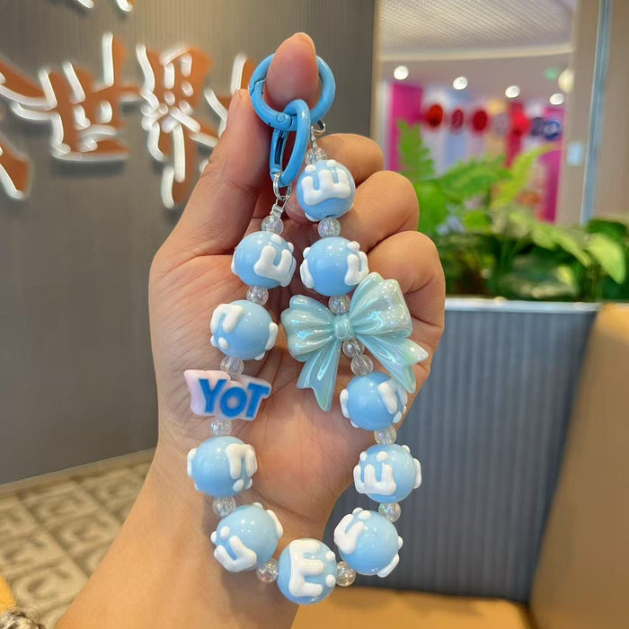 Wholesale Handmade bead painted bow, mobile phone chain pendant, letter bag pendant, hanging decoration