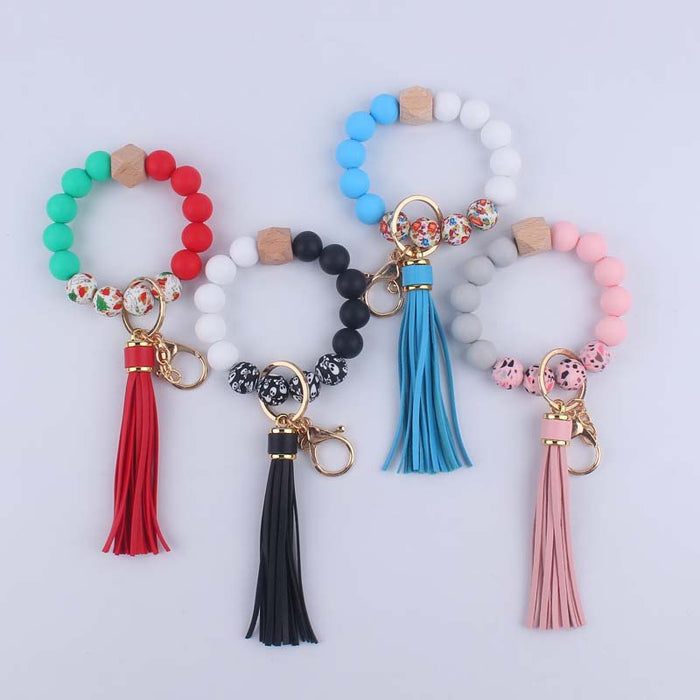 Wholesale Silicone leopard beads wrist keychain pendant leather PU tassel beaded bracelet accessories